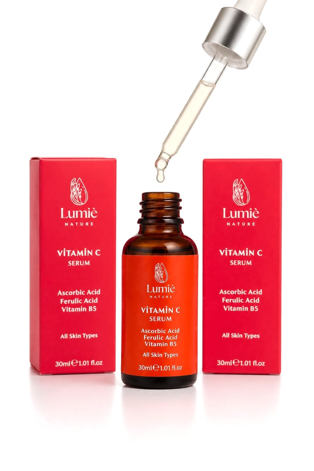 Damlalıktan damlayan Vitamin C Serum ve iki kutusu